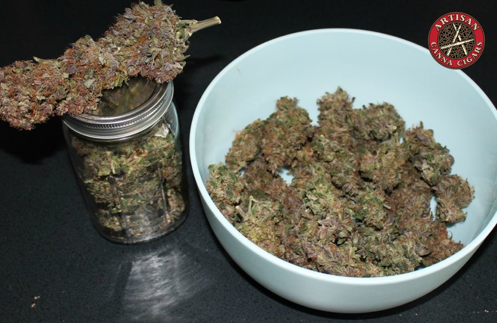 Cheetah Piss weed strain in Los Angeles 33 Stash Jar and Bowl of Purple Buds
